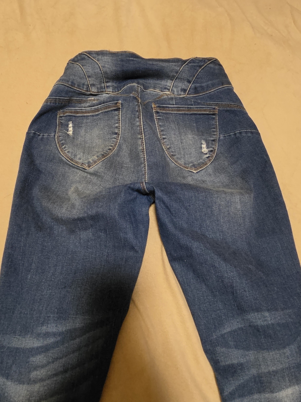 butt-lifting High-Rise Dark Blue Women’s Jeans.